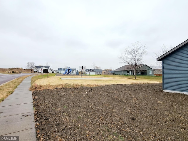 view of yard with a residential view