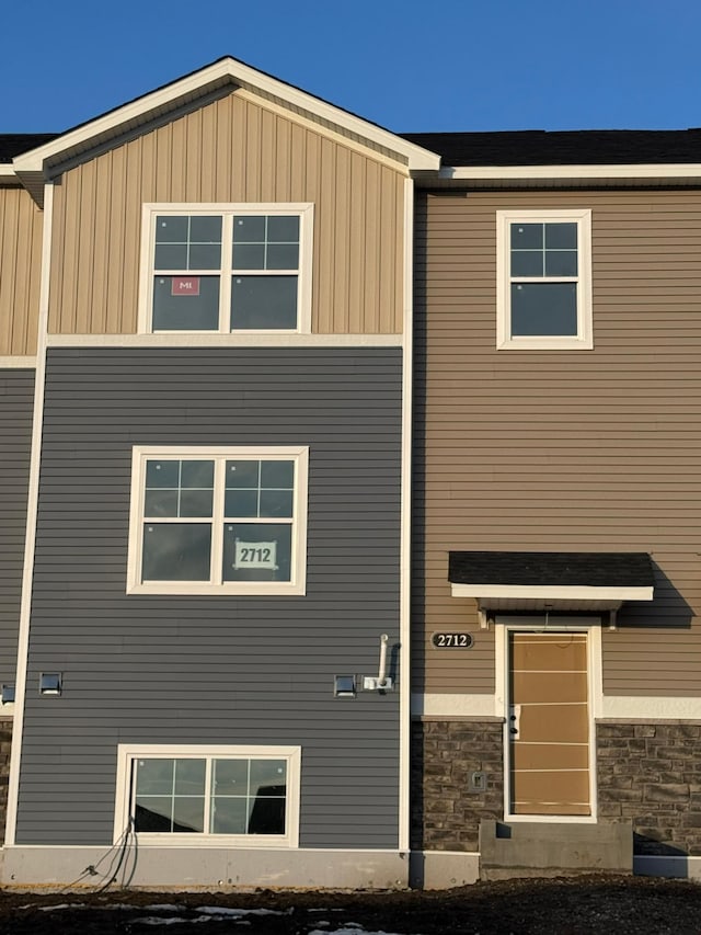 view of front of house featuring stone siding