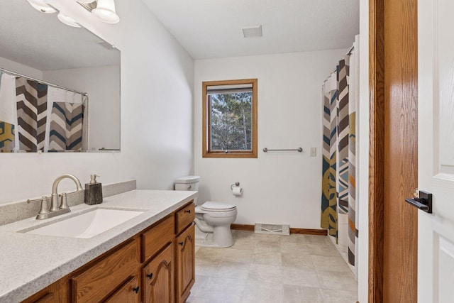 bathroom with vanity, baseboards, visible vents, curtained shower, and toilet