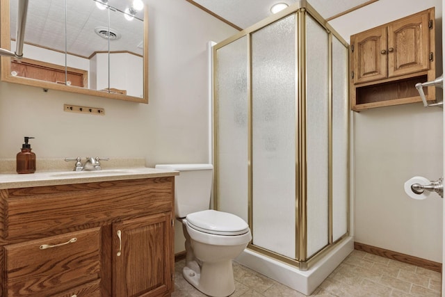 bathroom featuring visible vents, toilet, a stall shower, and vanity