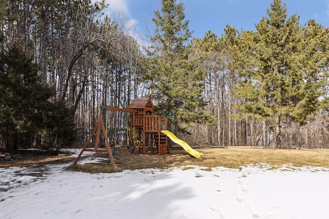 snow covered playground with a playground