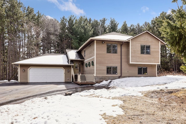 view of front of home featuring an attached garage and driveway