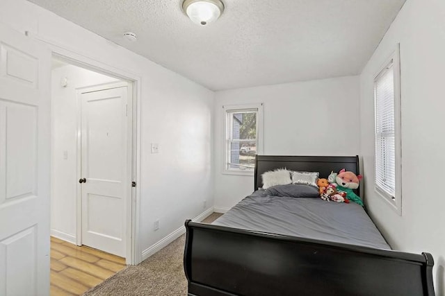 bedroom featuring a textured ceiling