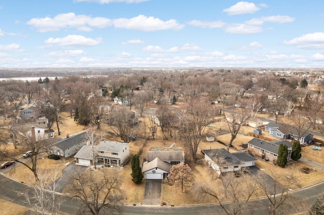 birds eye view of property with a residential view