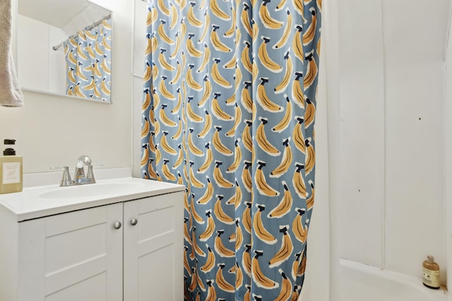 bathroom with vanity and a shower with shower curtain