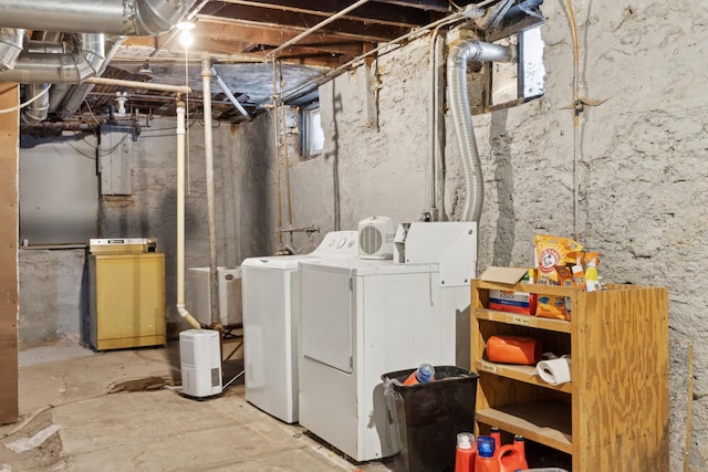 basement featuring washing machine and clothes dryer