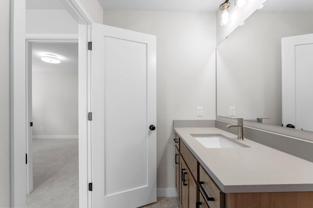 932 Orchard Ln, Roseville, MN 55113 - bathroom featuring vanity and baseboards