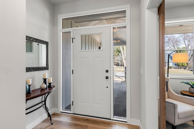 932 Orchard Ln, Roseville, MN 55113 - entryway with wood finished floors and healthy amount of natural light