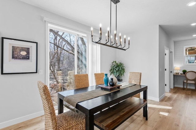932 Orchard Ln, Roseville, MN 55113 - dining area featuring light wood-type flooring, recessed lighting, and a chandelier