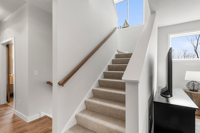 932 Orchard Ln, Roseville, MN 55113 - stairway featuring wood finished floors and baseboards