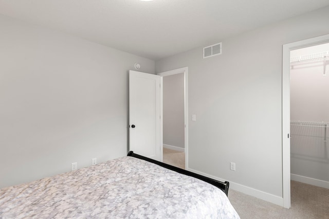 932 Orchard Ln, Roseville, MN 55113 - unfurnished bedroom featuring carpet and a spacious closet