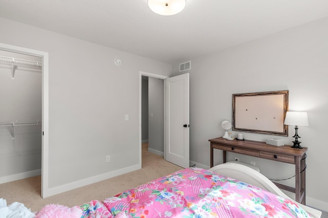 932 Orchard Ln, Roseville, MN 55113 - bedroom with carpet flooring and a walk in closet