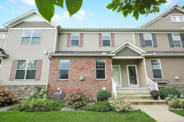 view of front of property featuring central AC unit