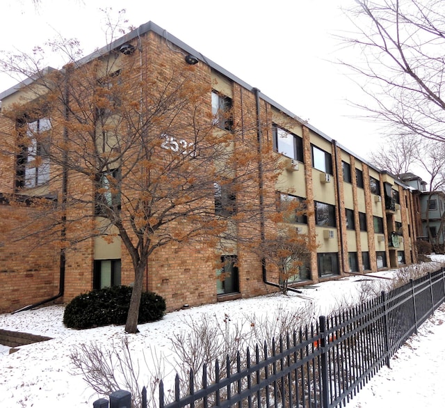 view of snow covered building