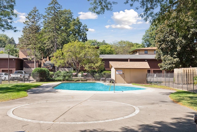 view of swimming pool featuring a patio