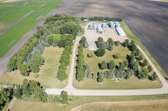 birds eye view of property featuring a rural view