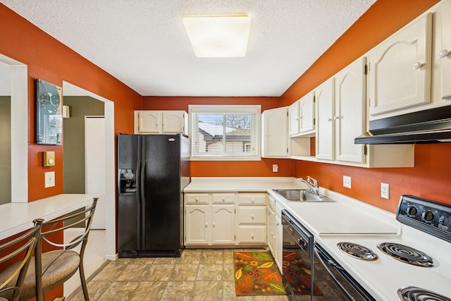 kitchen featuring under cabinet range hood, light countertops, a textured ceiling, black appliances, and a sink