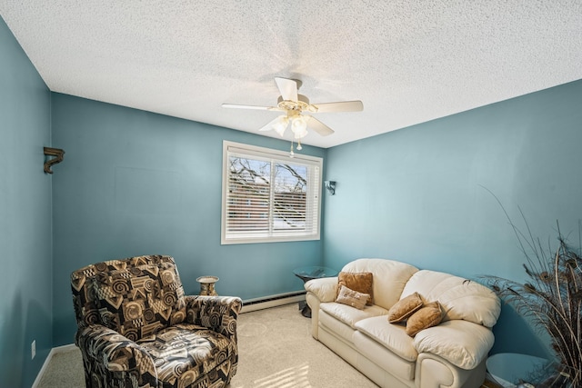 living area featuring a textured ceiling, a baseboard heating unit, and carpet flooring