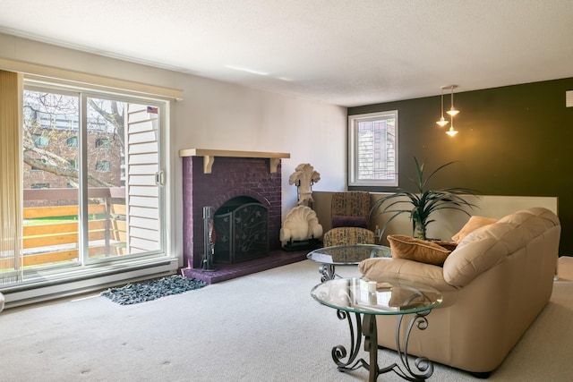 340 Ford Rd Unit 5, Saint Louis Park, MN 55426 - carpeted living area with healthy amount of natural light, a fireplace, and a textured ceiling
