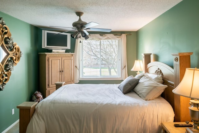 340 Ford Rd Unit 5, Saint Louis Park, MN 55426 - carpeted bedroom featuring a textured ceiling and ceiling fan