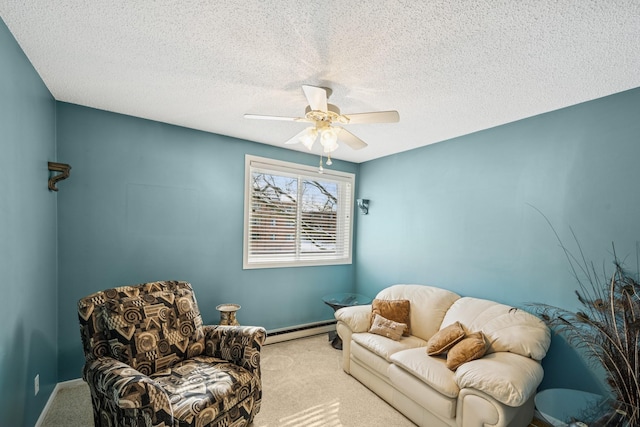 340 Ford Rd Unit 5, Saint Louis Park, MN 55426 - sitting room with carpet flooring, a baseboard radiator, ceiling fan, a textured ceiling, and baseboards