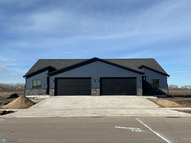 view of front of home with a garage