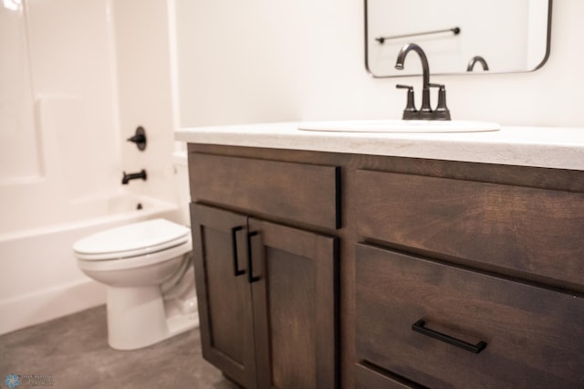 full bathroom featuring  shower combination, vanity, and toilet