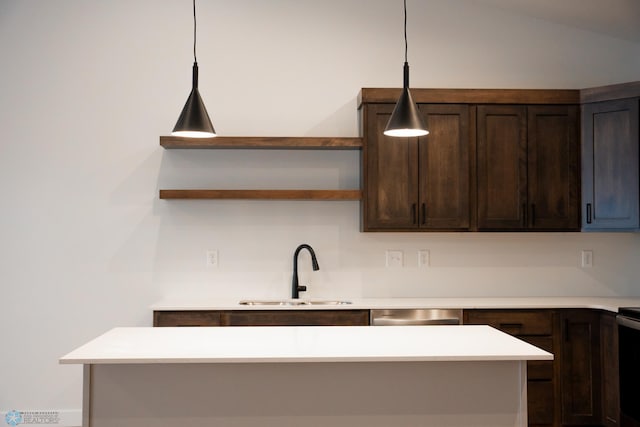 kitchen with lofted ceiling, dark brown cabinetry, sink, hanging light fixtures, and dishwasher