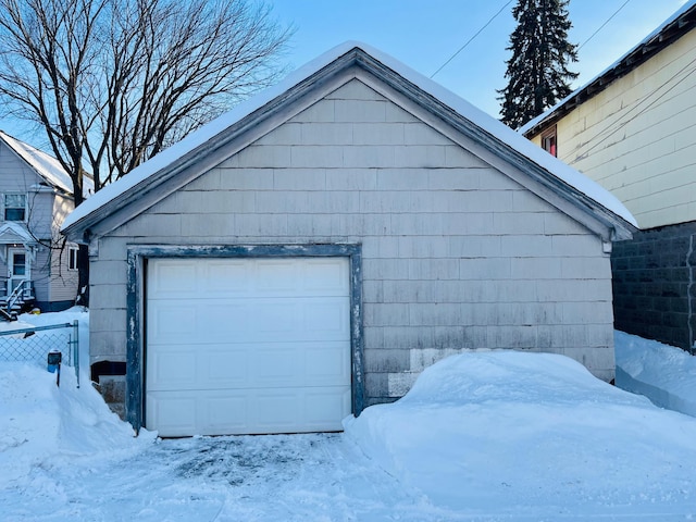 view of snow covered garage