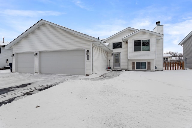 view of front of home with a garage