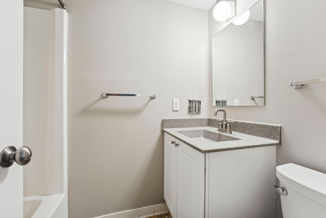 full bath featuring toilet and vanity