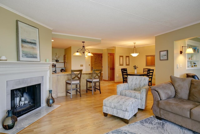 1077 Sibley Memorial Hwy Unit 607, Lilydale, MN 55118 - living room featuring ornamental molding, light hardwood / wood-style flooring, and a textured ceiling