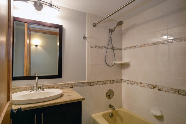 1077 Sibley Memorial Hwy Unit 607, Lilydale, MN 55118 - bathroom featuring tiled shower / bath and vanity