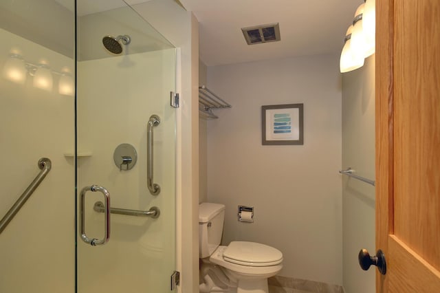 1077 Sibley Memorial Hwy Unit 607, Lilydale, MN 55118 - bathroom with toilet and a shower with shower door