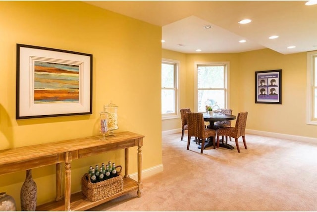 view of carpeted dining space