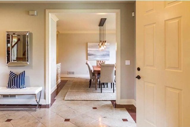 interior space with crown molding