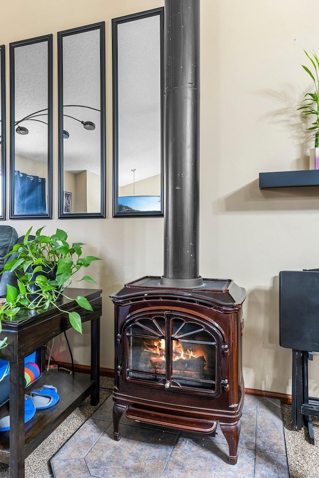 interior details featuring a wood stove