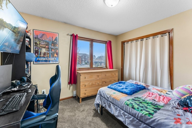 carpeted bedroom featuring a textured ceiling