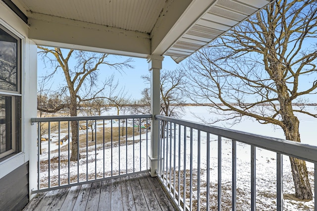 view of snow covered deck