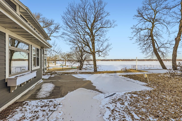 view of yard covered in snow