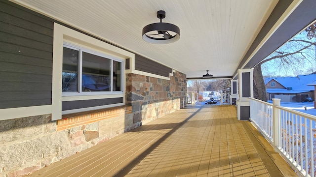 wooden terrace featuring a porch