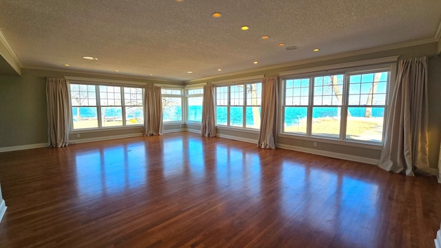 7 County Road 12 S, Buffalo, MN 55313 - unfurnished room featuring a textured ceiling, crown molding, dark wood-type flooring, baseboards, and recessed lighting