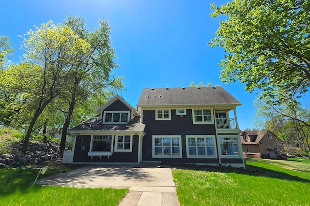 7 County Road 12 S, Buffalo, MN 55313 - rear view of house featuring a balcony and a yard