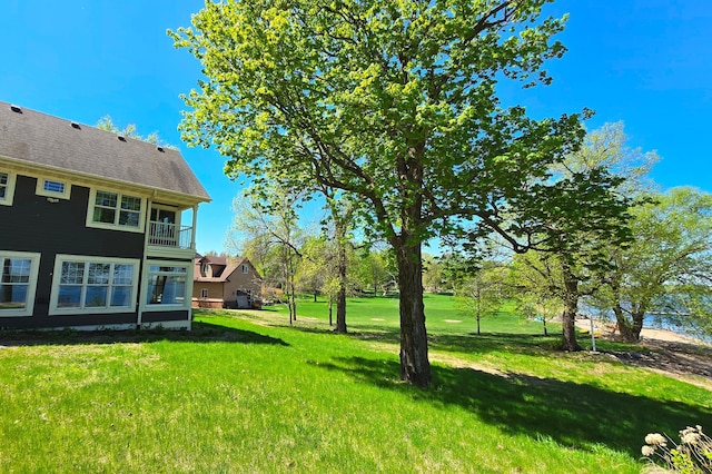 7 County Road 12 S, Buffalo, MN 55313 - view of green lawn with a balcony