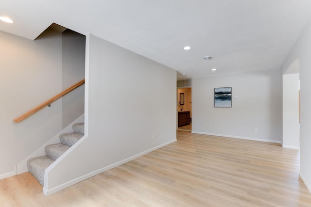 3571 Centerville Rd, Vadnais Heights, MN 55127 - staircase featuring recessed lighting, wood finished floors, and baseboards