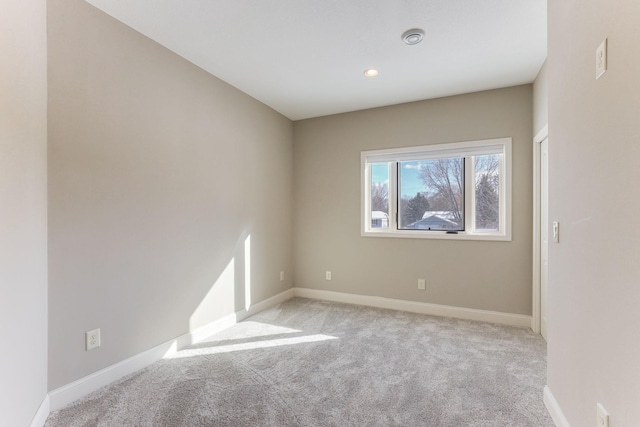3571 Centerville Rd, Vadnais Heights, MN 55127 - empty room featuring light colored carpet, baseboards, and recessed lighting