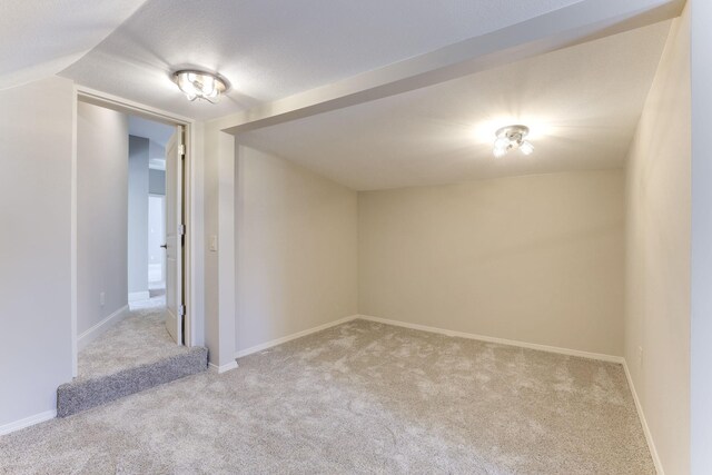 3571 Centerville Rd, Vadnais Heights, MN 55127 - spare room featuring carpet flooring and baseboards