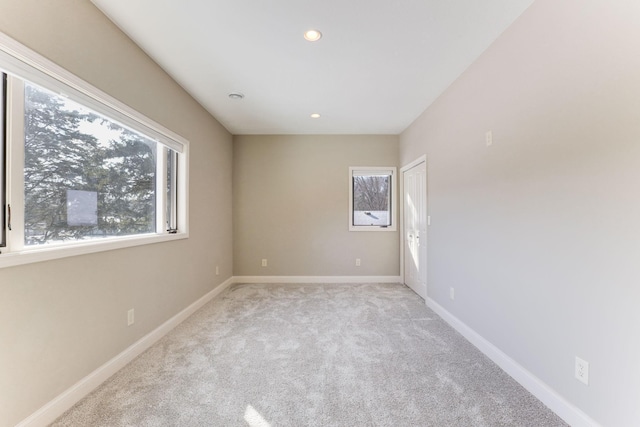 3571 Centerville Rd, Vadnais Heights, MN 55127 - empty room featuring light carpet, recessed lighting, and baseboards