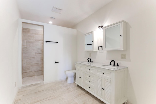3571 Centerville Rd, Vadnais Heights, MN 55127 - bathroom featuring double vanity, a walk in shower, and toilet
