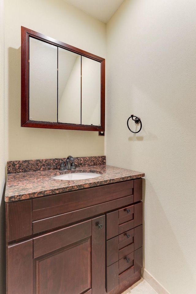 3571 Centerville Rd, Vadnais Heights, MN 55127 - bathroom featuring vanity and baseboards